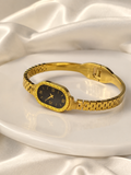 Gold Oval Cuff Watch