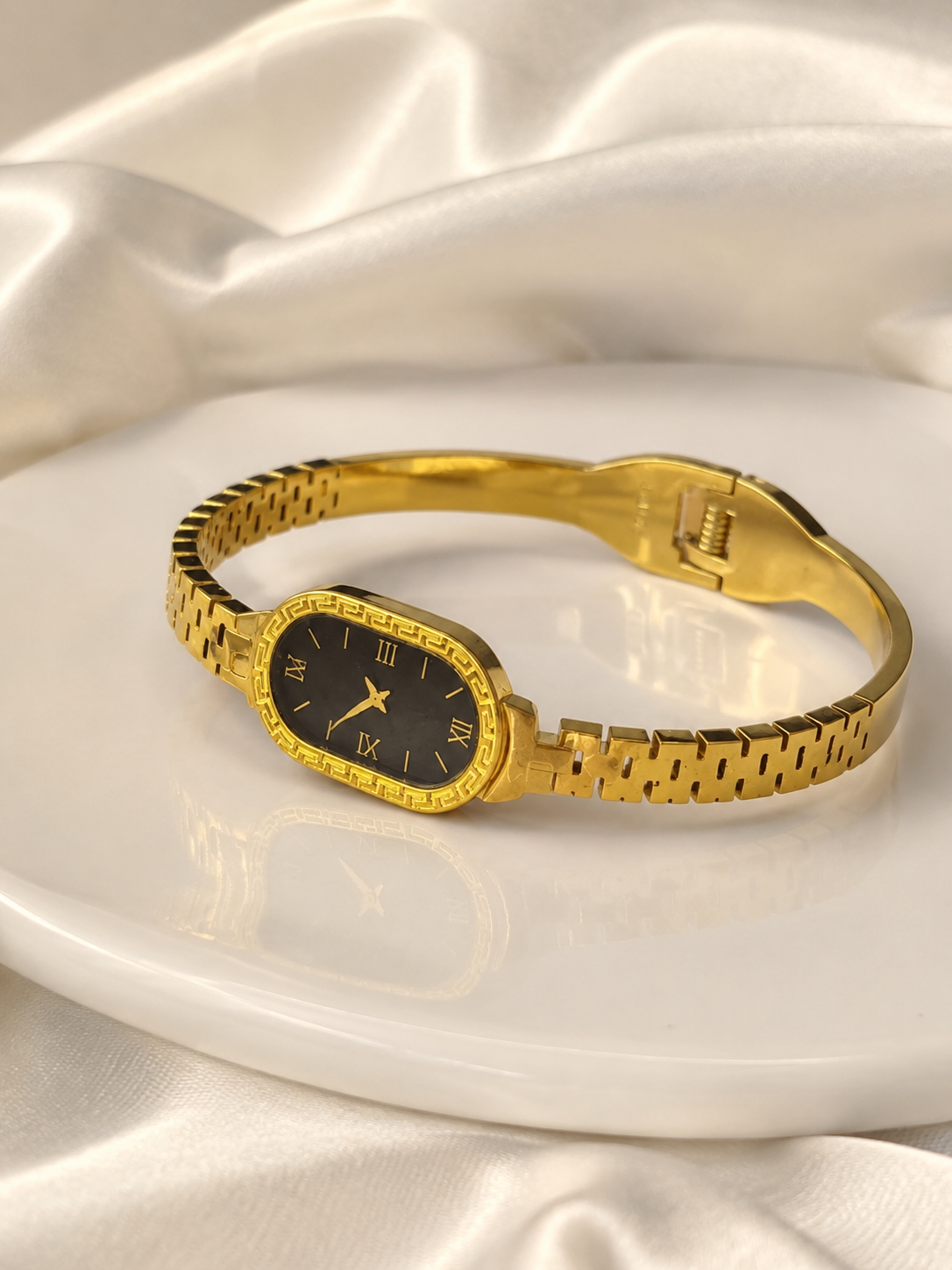Gold Oval Cuff Watch