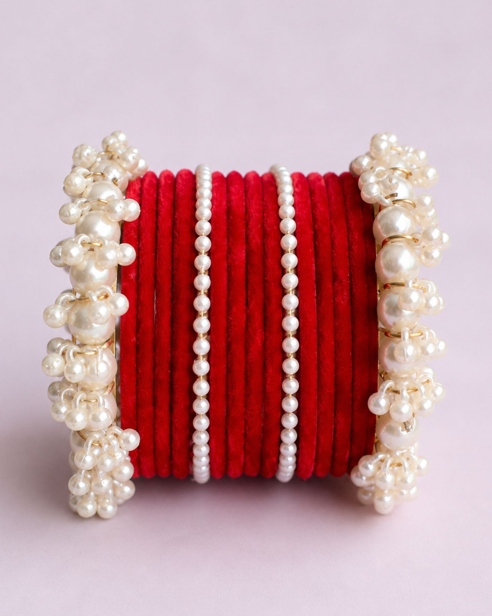 Valvet bangles with white pearls kary